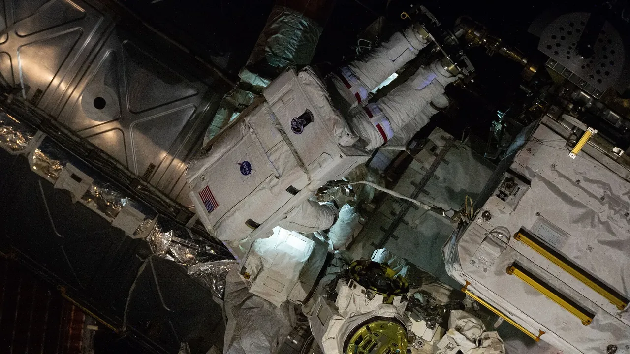NASA astronaut Chris Williams works outside the International Space Station during a spacewalk (iss074e0788297)