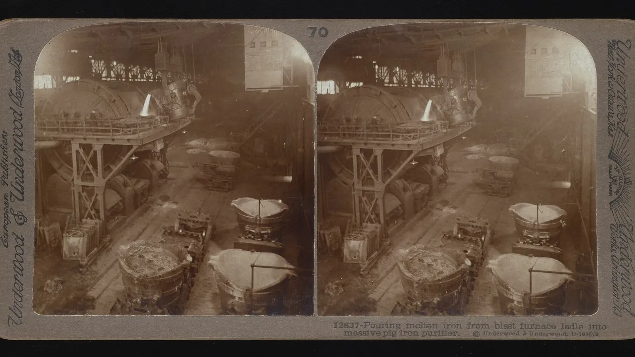 2015.028.031 Pouring molten iron from blast furnace ladle into massive pig iron purifier