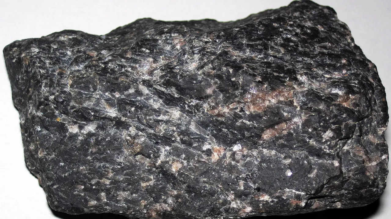 Black porphyritic metarhyolite (Utley Rhyolite, Paleoproterozoic, 1765 Ma; Utley Rhyolite Quarry, near Green Lake, Wisco