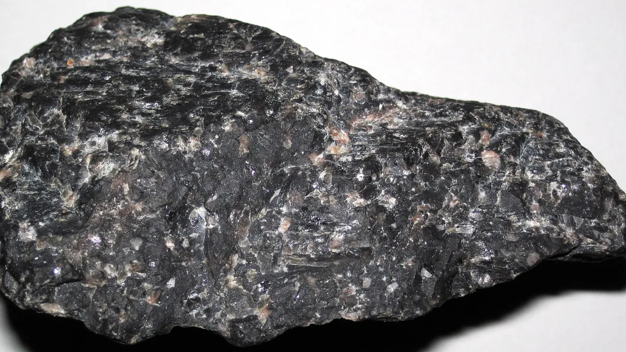 Black porphyritic metarhyolite (Utley Rhyolite, Paleoproterozoic, 1765 Ma; Utley Rhyolite Quarry, near Green Lake, Wisco