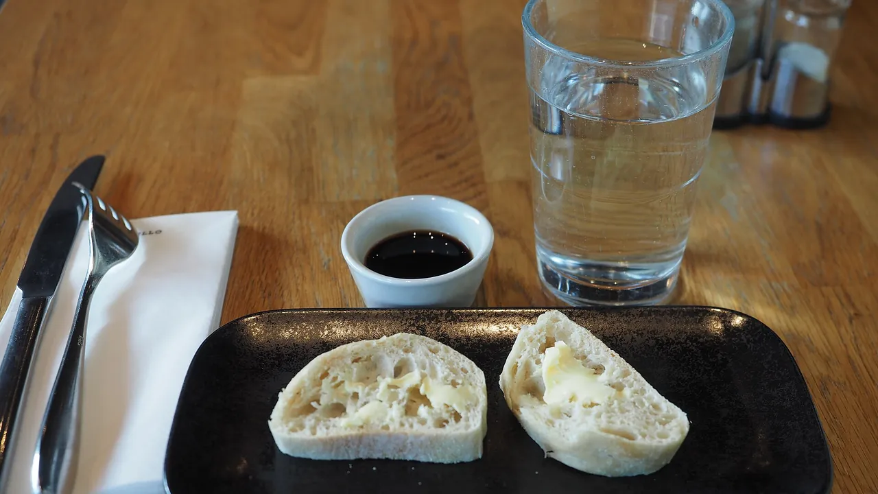 Bread and olive oil at restaurant La Torrefazione Lasipalatsi