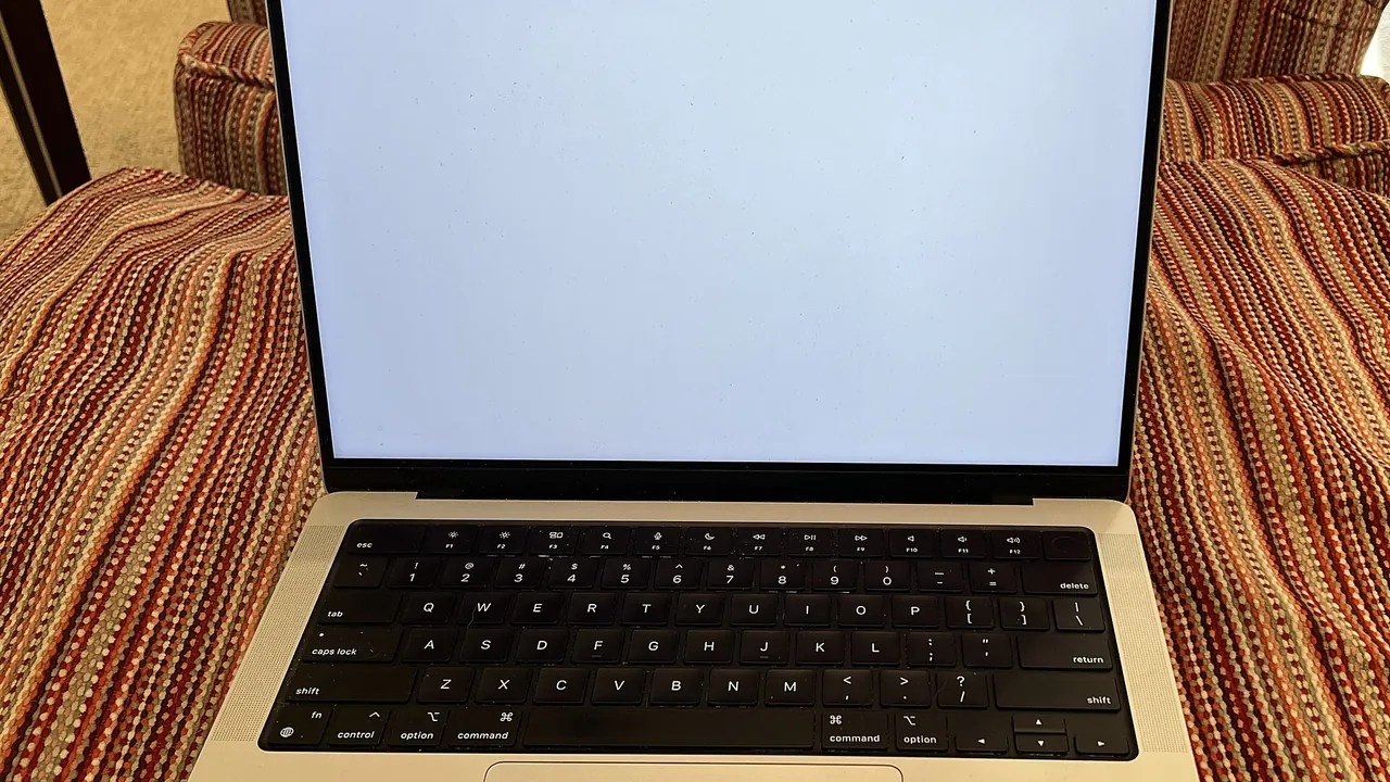 A 2021 14-inch Silver MacBook Pro (cropped)