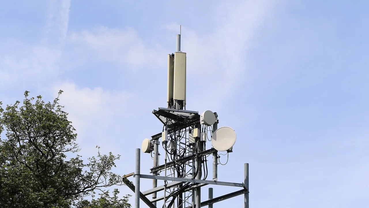 Cell phone mobile phone mast at Theydon Bois, Essex, England