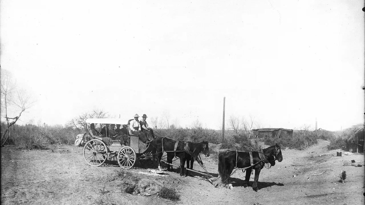 Full stagecoach along a dirt road, Yuma, ca.1905 (CHS-4250)