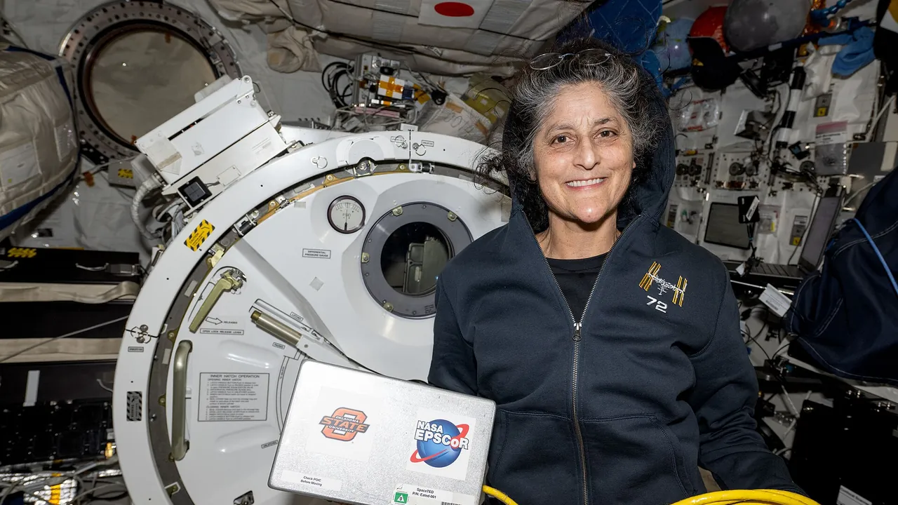 Iss072e143492 (Nov 1, 2024) --- NASA astronaut and Expedition 72 Commander Suni Williams displays the Space Tissue Equiv